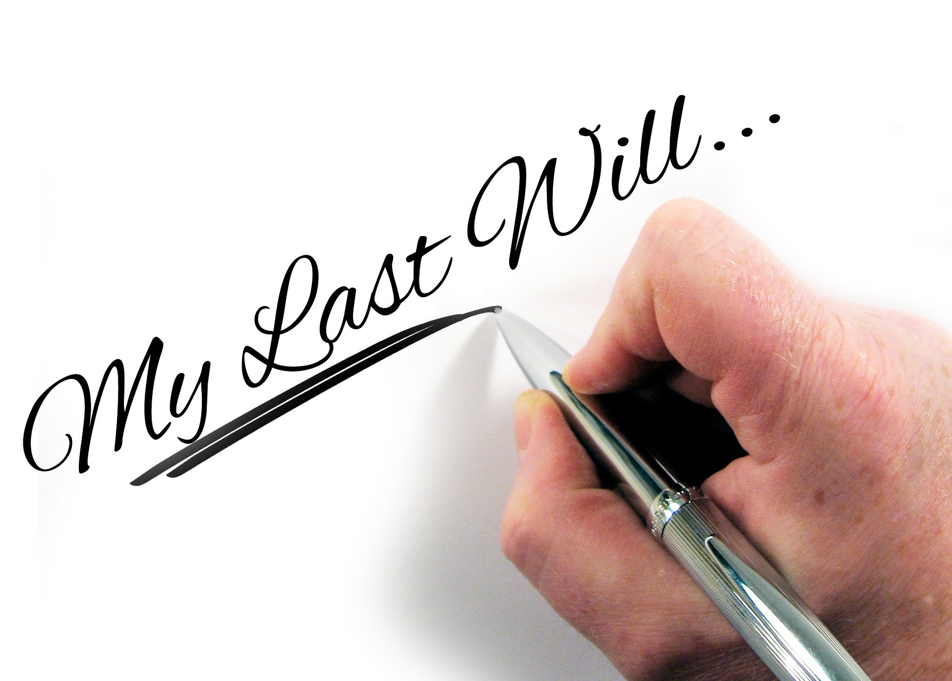 hand with a pen writing my last will