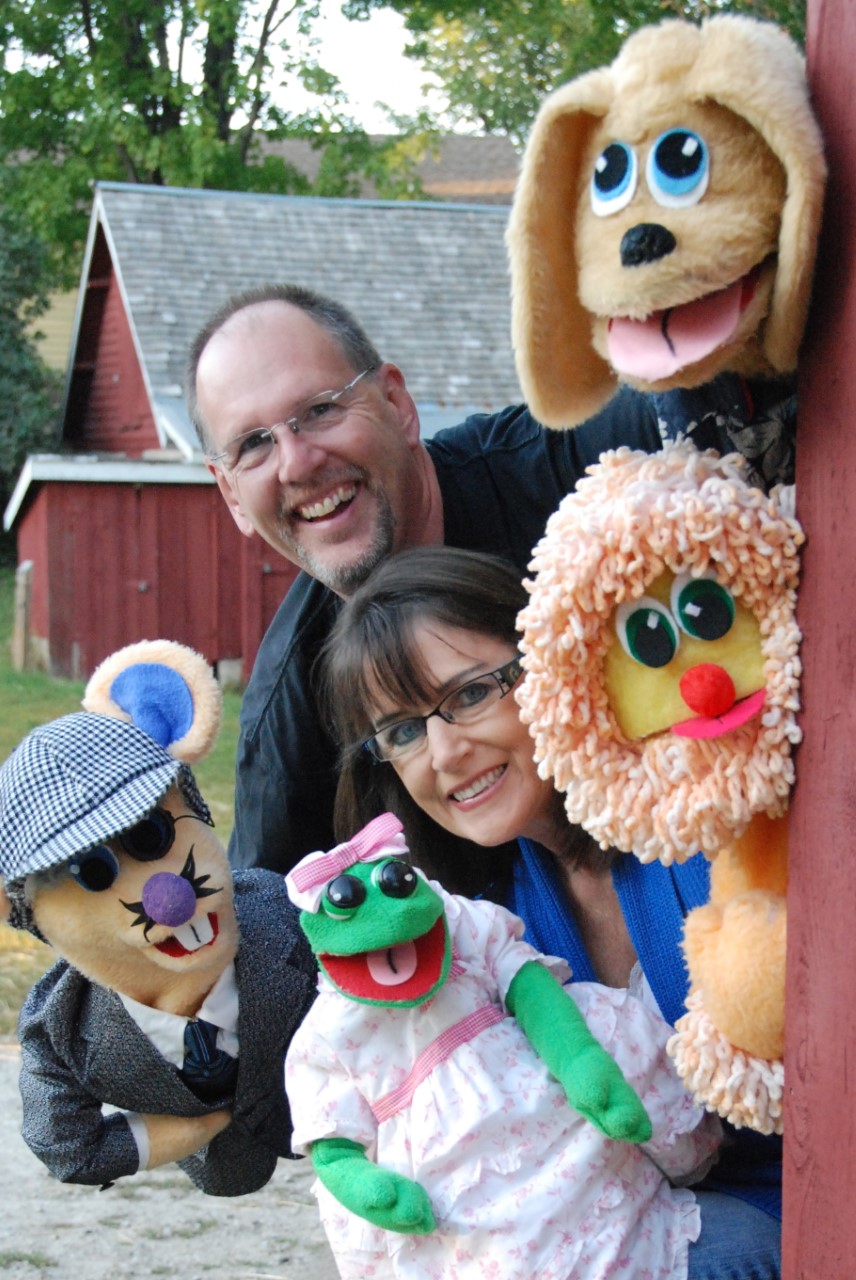 Puppeteers with puppets