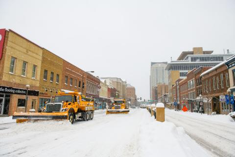 snow plows clearing snow from Broadway