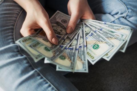 Variety of USD bills fanned out