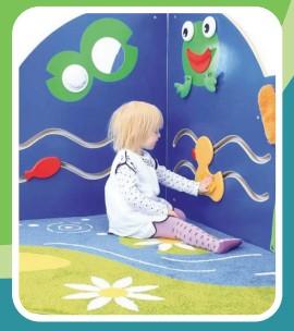 baby in a nature themed play area