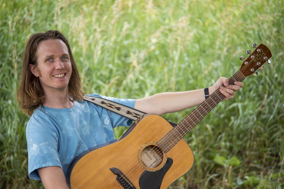 Will Bjorndal with guitar