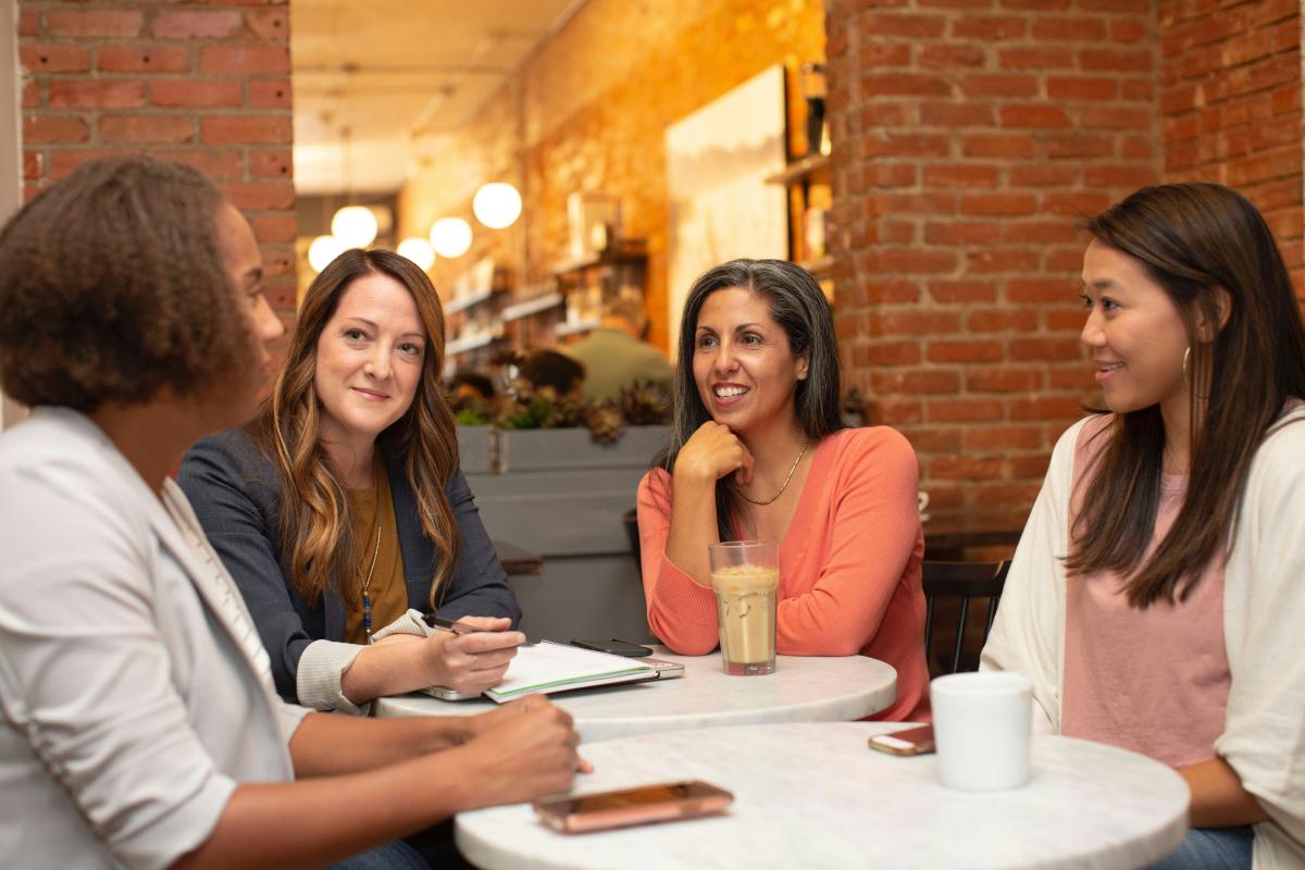 women sitting around a table
